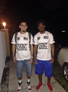 Lopez (left) and Patrick Robinson (right) of the New Orleans Saints pose together after Robinson agreed to dress his entire defensive backs unit with DSBG shirts.